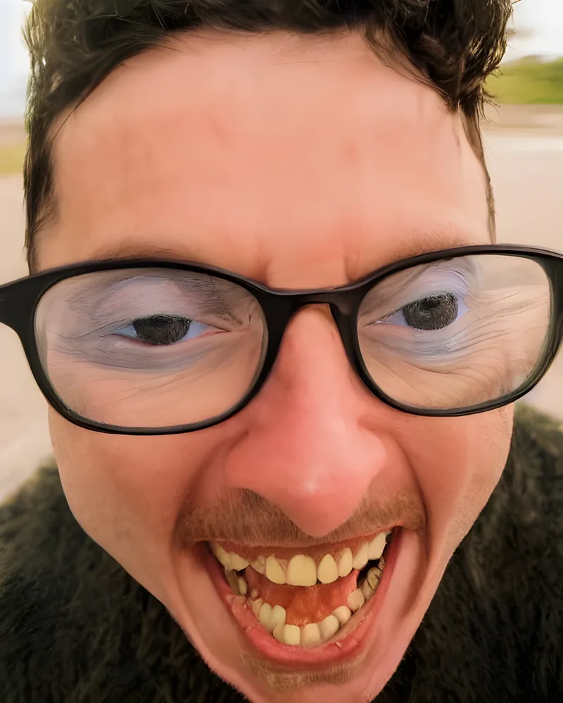 Nutty Bobby, very close to the camera, grinning